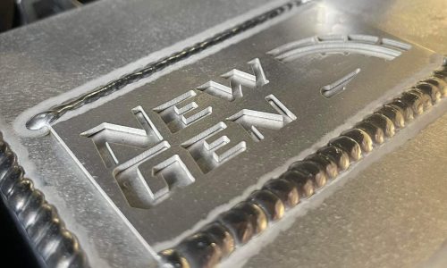 New Gen Customs logo fabricated badge on custom fabricated inter cooler